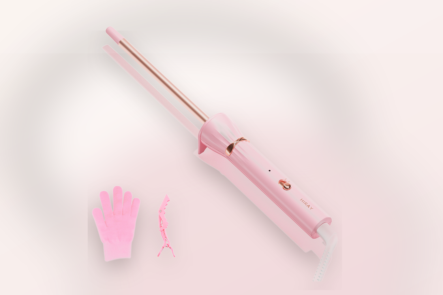 Pink 9mm curling wand in a premium studio campaign